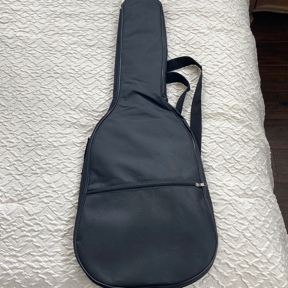 Fender Squier Stratocaster black. With fender auto clip tuner and two picks.